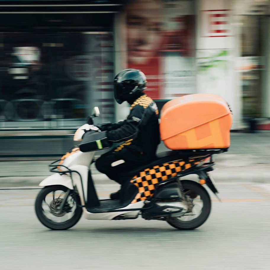Delivery driver injured in motorcycle accident